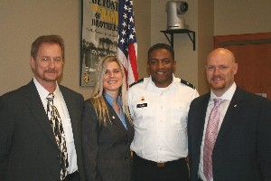 Joining together at the March meeting are (l-r) Patrick O'Brien, chapter treasurer; Pam Plesz, chapter secretary; Brig. Gen. Frederick A. Henry, USA, deputy commanding general, U.S. Army Network Enterprise Technology Command; and John Snider, chapter president.